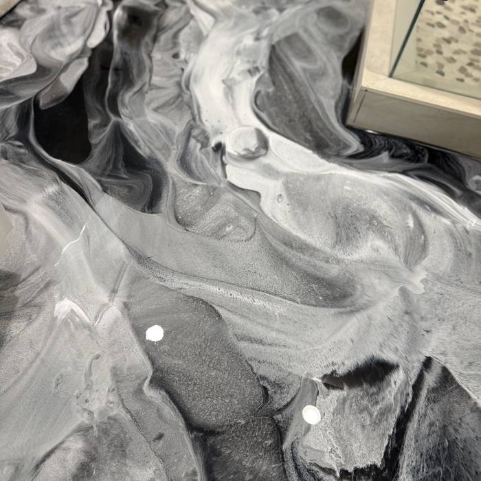 Black and white metallic epoxy swirl