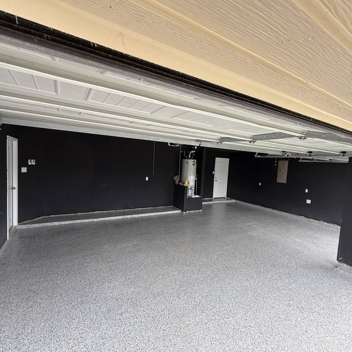 Dark commercial shop with a glossy flake floor
